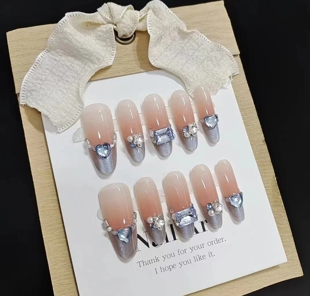 Blå bärnsten Cat Eye Press-on-naglar Fransk tip Strass Lång oval