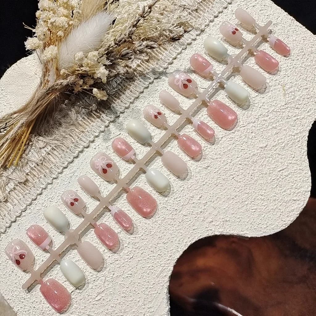 Körsbär kattöga press-on naglar rosa glitter kort ballerina stil