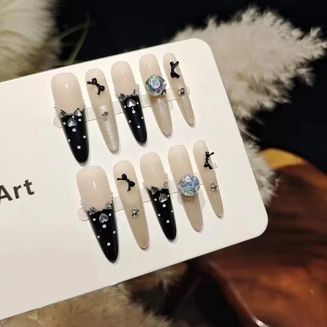Svarta fjärilsstrass lösnaglar, kattögonsglitter manikyr