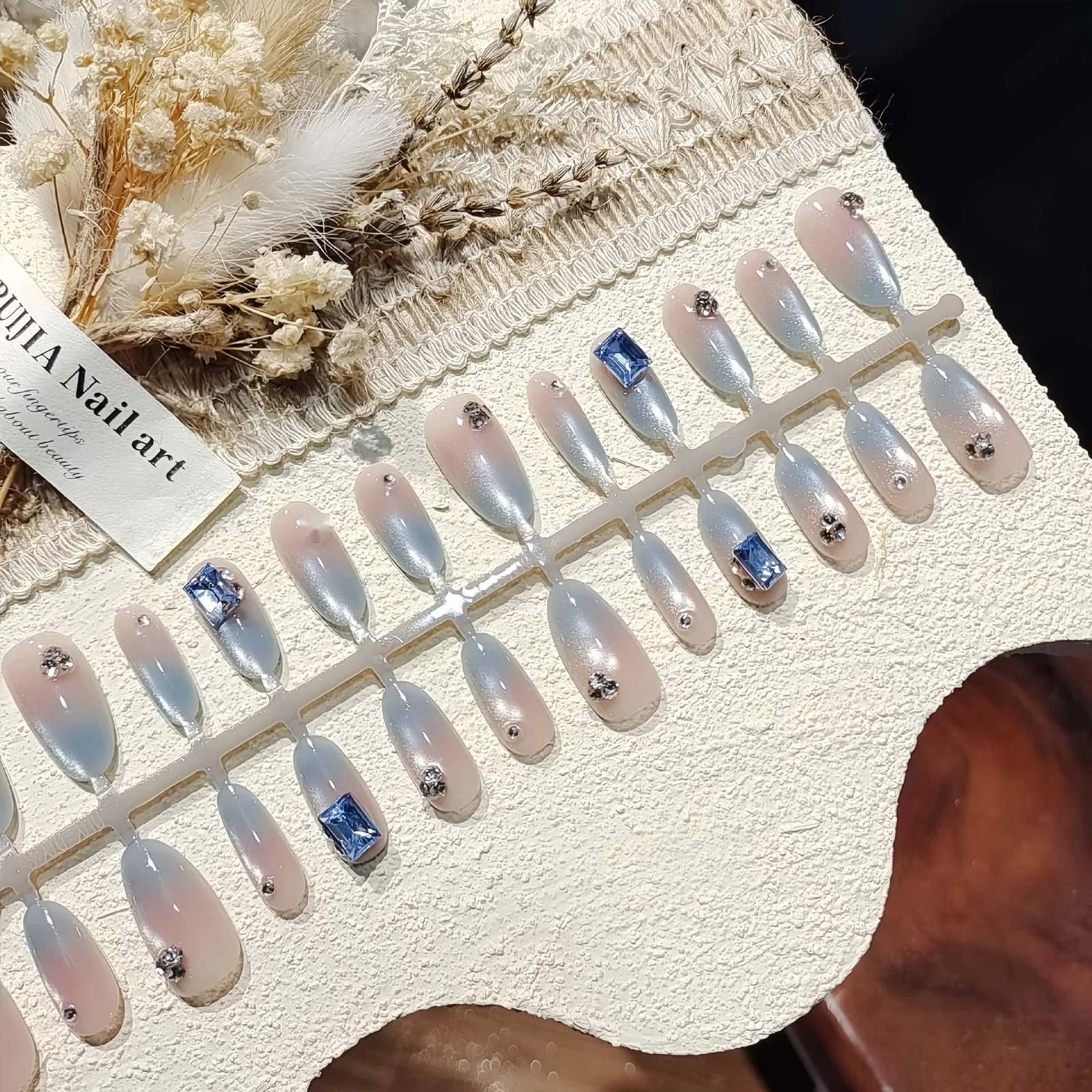 Isblå Cat Eye Lösnaglar med Glittergradient Medel Oval